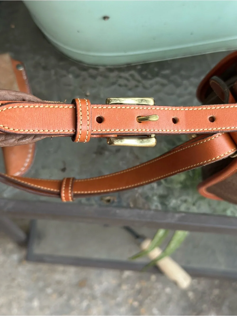 Dooney & Bourke Brown Pebbled Leather Horseshoe Crossbody with Tan Trim